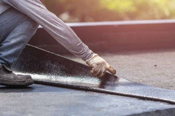 Professional Waterproofing technician working in Wales, WI